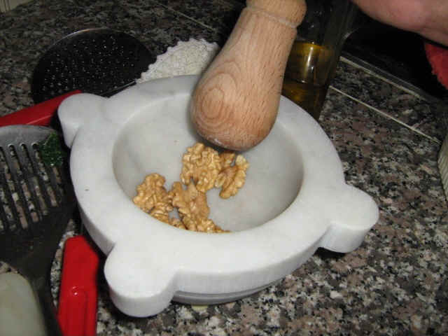 mortar with walnuts